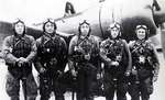 Shortly before taking off from Chôshi airstrip, Japan, Japanese Special Attack pilots Tetsuya Ueno, Koshiro Hayashi, Naoki Okagami, Takao Oi, and Toshio Yoshitake posing in front of a Ki-51 attack aircraft, 8 Nov 1944