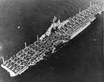 USS Essex departing San Francisco Naval Shipyard, California, United States, 15 Apr 1944, photo 4 of 4; note camouflage measure 32 design 6/10D