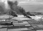 A TBF-1C Avenger over Tinian, Mariana Islands, Jul 1944 during an attack on the Japanese Ushi Point Airfield, later to become North Field.