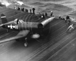 F4U Corsair of Marine Fighting Squadron VMF-124 on the flight deck of USS Essex, 25 Jan 1945.