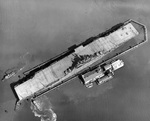 USS Intrepid entering the deperming station at Norfolk, Virginia, United States, 11 Sep 1943. Note the outline of the ship’s waterline painted on the flight deck. Photo 3 of 3.