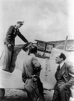 Hans-Joachim Marseille (on wing) with Willy Messerschmitt (right) after trying out the new “Gustav” (Bf-109G) at the Messerschmitt plant, Augsburg, Germany, early 1942