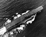 USS Enterprise in her new Measure 33-4Ab paint scheme leaving Pearl Harbor, Hawaii for exercises, 4 Aug 1944. Photo 3 of 4.