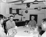 Admiral Halsey, Rear Admiral Charles P Mason, Captain Austin K Doyle, and an unidentified captain in the captain