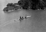 Post-war photo of the hulk of the battleship Hyûga, badly battered and sunk in shallow water near Kure, Japan on 24 Jul 1945. This photo was taken in Sep 1945.