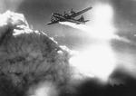 B-29 Superfortress of the 29th Bomb Group trailing smoke with number-4 engine feathered over Japan, 17 Jul 1945