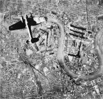 German He 111 bomber in flight northbound over Surrey Docks, London, England, United Kingdom at 1700 hours on 7 Sep 1940, photo 2 of 2