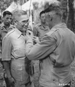 Lieutenant General Joseph Stilwell awarding the Legion of Merit to Chinese 22nd Division commanding officer Major General Liao Yaoxiang, Burma, early 1944