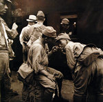 Demobilized Japanese soldiers at a train station in Hiroshima, Japan, Sep 1945