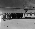 Aboard two Mitsubishi G4M ‘Betty’ bombers in surrender markings, a Japanese delegation stopped at Ie Jima, Ryukyu Islands en route Manila, Philippines for a surrender briefing, 19 Aug 1945. Photo 09 of 12.