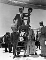 Aboard two Mitsubishi G4M ‘Betty’ bombers in surrender markings, a Japanese delegation stopped at Ie Jima, Ryukyu Islands en route Manila, Philippines for a surrender briefing, 19 Aug 1945. Photo 11 of 12.