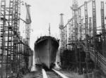 Launching ceremony of a newly constructed sloop for the Royal Indian Navy, HMIS Kistna, at Yarrows Yard, Clydebank, Scotland, United Kingdom, 22 Apr 1943