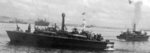 PT-331, an Elco 80-footer of Motor Torpedo Boat Squadron 21 (MTBRon 21), in Leyte Gulf, 1945. Note shell splashes in the distance.