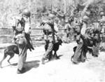 US Marines with war dogs, Guam, Jul-Aug 1944