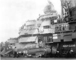 TBM-1C Avenger crash landed aboard USS Hornet (Essex-class) after the landing gear collapsed due to hydraulic failure from battle damage, 15 Jun 1944. Photo 2 of 2.