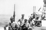 PT-377, an 80-foot Elco boat with MTB Squadron 27, transporting Vice Admiral Michiaki Kamada (not pictured) and staff to the signing of the Japanese surrender of Borneo aboard HMAS Burdekon in Makassar Strait, 8 Sep 1945