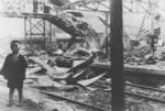 Boy in the ruins of South Station, Shanghai, China, 28 Aug 1937