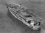 USS Independence, damaged in atomic bomb tests, in San Francisco Bay being prepared for sinking after efforts to wash off the radioactivity were unsuccessful, Jan 1951