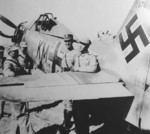 Chinese observers attached to Allied units posing with a captured German Fw 190 fighter, North Africa, 15 May 1943; left to right: Major Huang, General Lam (Air Force), General Hu Xianqun, Colonel Lee (military intelligence)