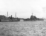 Cruiser USS St. Louis coming alongside repair ship USS Vestal at Espiritu Santo, New Hebrides for initial repair of torpedo damage to her bow received in the Battle of Kolombangara, 16 Jul 1943