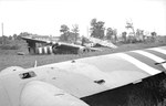 The wrecks of 3 Horsa gliders in a field beside the Caen Canal near Bénouville, Normandy, France, 12 Jul 1944.