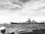 Battleship USS Missouri in Sagami Wan, Japan, 30 Aug 1945. Note Mount Fuji, Missouri flying Admiral William Halsey’s four-star flag at the after mast, and the US flag at the unusual location on the main mast.