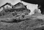 Japanese Infantry and a Type 89 tank during the Battle of Nanchang, China, 1939