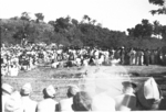 Spectators watching a fire walker, Calcutta, India, late 1944, photo 5 of 5