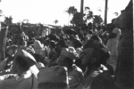 Spectators watching a fire walker, Calcutta, India, late 1944, photo 3 of 5