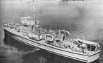 United States Navy sub chaser SC-1075 on the Delaware River, 9 Aug 1943. Note Mousetrap anti-submarine rocket rails on the foredeck, 20mm Oerlikon ant-aircraft guns, and side-dropping depth charge racks.