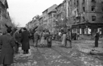 ISU-152 self-propelled guns and a T-34-85 tank on Kisfaludy Street, Budapest, Hungary, 30 Oct 1956, photo 1 of 4