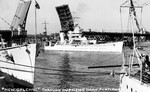 USS New Orleans passing through the open Burnside Drawbridge in Portland, Oregon, United States, 2 Aug 1934. New Orleans was escorting USS Houston (left) which brought President Franklin Roosevelt to Oregon.