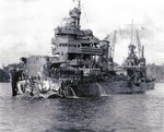 Down by the bow, USS New Orleans arriving in Tulagi Harbor, Solomon Islands, 1 Dec 1942. The night before, New Orleans was struck by a torpedo in the Battle of Tassafaronga that blew off 150 feet of her bow.