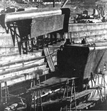 USS Growler’s replacement bow being lowered into place at the South Brisbane Drydock, Brisbane, Queensland, Australia, Apr 1943.