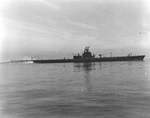 USS Growler departing Brisbane, Queensland, Australia with her freshly refitted replacement bow, 5 May 1943. Note deck gun forward of the conning tower when it had been aft prior to this refit.