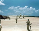 Aboard two Mitsubishi G4M ‘Betty’ bombers in surrender markings, a Japanese delegation stopped at Ie Jima, Ryukyu Islands en route Manila, Philippines for a surrender briefing, 19 Aug 1945. Photo 03 of 12.