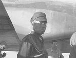 Japanese Imperial Army Lt General Torashiro Kawabe, leader of the Japanese surrender delegation, as he waited for transfer between his incoming Japanese G4M transport and his outgoing American C-54 at Ie Jima, 19 Aug 1945