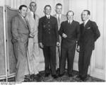 Pilots Boleslaw Orlinski of Poland, Richard Atcherley of Britain, Alois Kubita of Czechoslovakia, A. Williams of United States, Ernst Udet of Germany, and Mario De Bernardi of Italy at Carlton Hotel, New York, New York, United States, Aug 1931