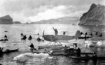 Ernst Udet (on aircraft wing) in Greenland, still picture from the film "S. O. S. Iceberg", 1932