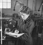 WAAF C. F. Garnet working with the RAF Maintenance Unit, possibly RAF Bridgnorth, Shropshire, England, United Kingdom, 1942