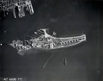 Aerial view of Goat Island in Narragansett Bay and within the City of Newport, Rhode Island, United States which became home to the United States Navy’s Bureau of Ordnance Naval Torpedo Factory in 1869.