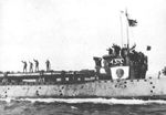 Japanese Type 1 Kaitens on the deck of mother-sub I-370 at the Japanese Kaiten base at Otsujima in Japan’s Inland Sea, 21 Feb 1945.