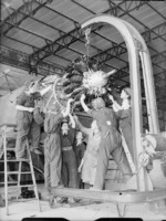 WAAF flight mechanic trainees installing a rotary engine at No. 6 School of Technical Training, Hednesford, Staffordshire, England, United Kingdom, date unknown