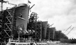 Merchant ships Dominican Victory, Yugoslavia Victory, Plymouth Victory, Niantic Victory, Rock Island Victory, Claremont Victory, and Rutland Victory at Kaiser Oregon Shipbuilding Corporation yard, Portland, Oregon, United States, early 1944