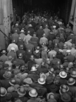 Shipyard workers arriving at the Kaiser Richmond Shipyards by ferry, Richmond, California, United States, Feb 1943