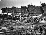 LSTs disembarking troops during the Leyte landings at White Beach, Tacloban, Leyte, Philippines, 20 Oct 1944.