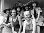 WAAF personnel cheering at the RAAF and WAAF swimming carnival at the Valley baths, Brisbane, Australia, 12 Dec 1943