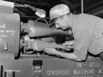 Male worker at the Small Arms Ltd. plant, Mississauga, Ontario, Canada, date unknown