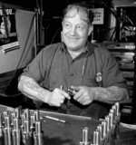 Male worker at the Small Arms Ltd. plant, Mississauga, Ontario, Canada, date unknown