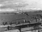 Gunboat USS Sacremento at Qingdao, Shandong Province, China, 1920s or 1930s; note submarine USS S-39 in foreground